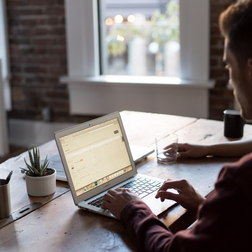 Man at a laptop in an office
